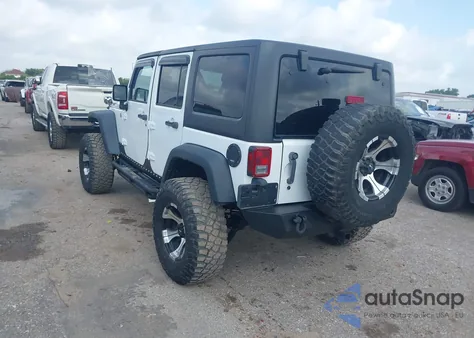2011 Jeep Wrangler Unlimited Rubicon из США, поврежденный, VIN 1J4BA6H10BL536027